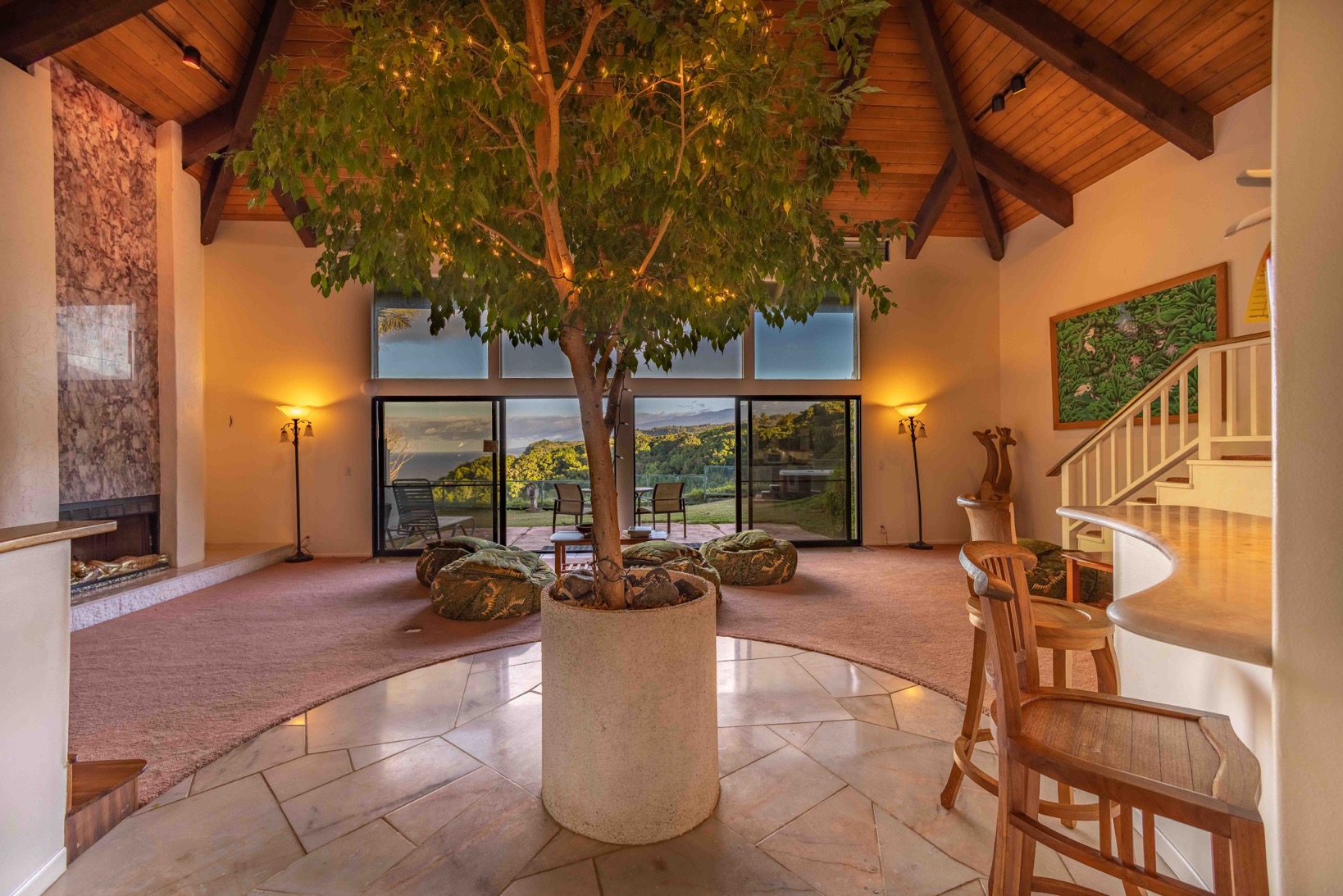 The Villa: Living room/ yoga retreat hall with a living tree in the center