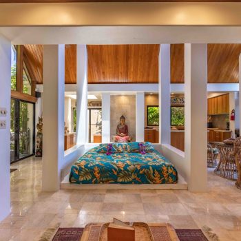 Cliff House: Buddha statue and sofa bed in a center of the living room